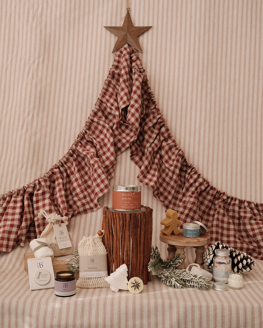 A range of Love to b Christmas gifts on a tablecloth