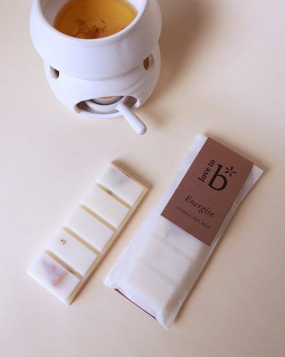 A wax melt bar labeled &