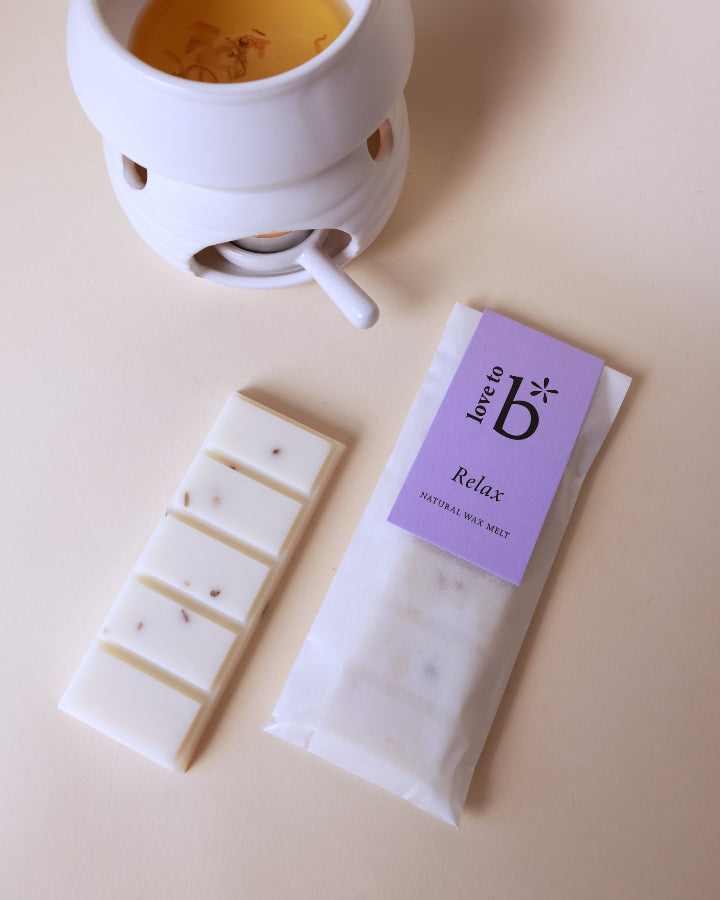 A packaged soy wax melt labeled &